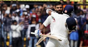 Kohli's 211 and Rahane's 188 propels India to a huge total