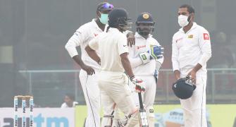 Sri Lanka go behind masks after Kohli's record double