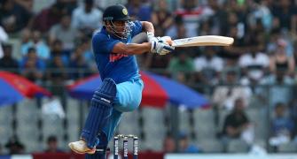 Dhoni unperturbed by calls to quit