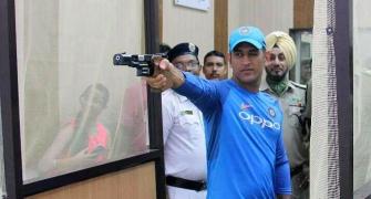 First Look: Dhoni goes shooting after practice washed out