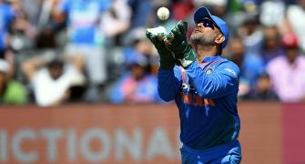Twin world records for Dhoni in India's T20 win