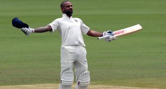 Dhawan joins Bradman with century before lunch on Day 1
