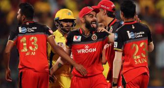IPL PHOTOS: MS excels, but RCB win off last ball