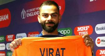 Captain Kohli gives thumbs-up to new orange jersey