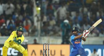 Ist ODI PIX: India ride on Jadhav, Dhoni fifties to beat Australia