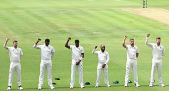 South Africans raise fists before Test against Lanka