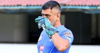 SEE: Dhoni fan breaches security to touch his feet