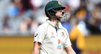 Warner comes to Smith's defence