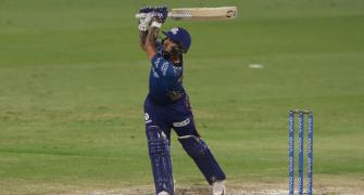 IPL PIX: Mumbai humble Royals to stay in play-off race