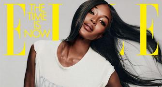Is Naomi Campbell wearing just a T-shirt?