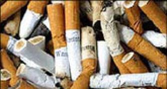 Australia imposes tough rules on cigarette firms