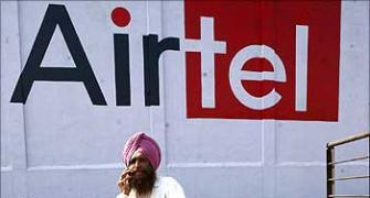 Bharti Retail, Airtel tie up for bill payments