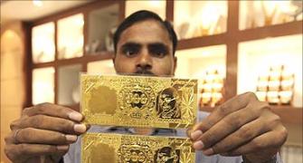 Don't rush to buy gold just yet