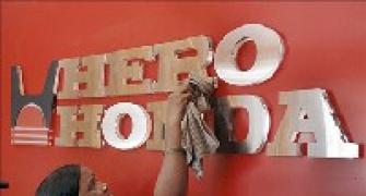 Hero Honda promoters pledge shares, raise Rs 2 bn