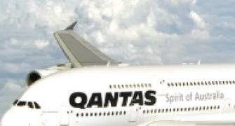 Disasters force Qantas to slash jobs