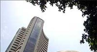 Volatile Sensex ends flat, bankex weighs