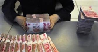 Chinese yuan seen depreciating further; rupee to remain stable
