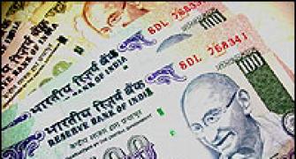 Rupee at 32-month low of Rs 51.50 per US dollar