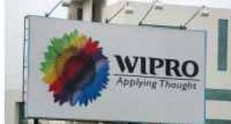 Wipro promoters to cut stake via auction