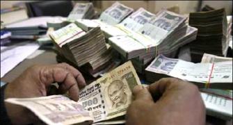 Rupee snaps 2-week rise; down 25 paise to 66.46