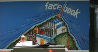 Facebook raises IPO price range to $34-38