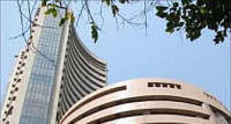 Markets open lower tracking global cues
