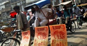 With economy sinking, India gets tough with 'babus'