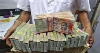 Rupee trims initial gains Vs dollar; still up 32 paise
