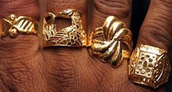 FM wants curbs on gold import to continue