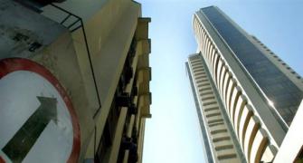 Sensex gains 200 points as rupee recovers; Banks lead