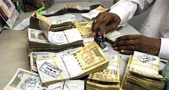 Rupee could touch 75/USD: BofA-ML