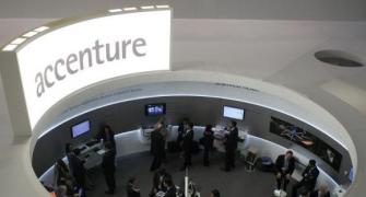 Accenture CUTS full-year outlook as consulting SLOWS