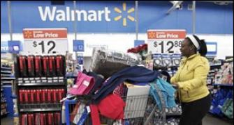 Wal-Mart profits may be hit by overseas bribery probe