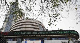 Markets end at record highs; Sensex gains 300 points
