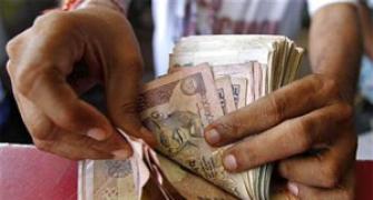 Rupee snaps two-day fall as exporters, corporates sell dollars
