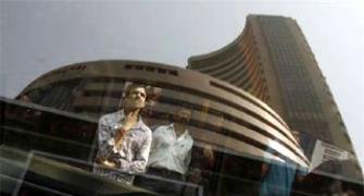 Sensex pares earlier gains; banks under pressure, metals shine