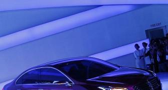 Maruti Suzuki unveils min-SUV, SX4 replacement