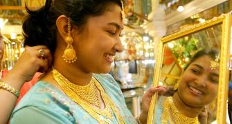 Gold, silver prices ease on low demand, global cues