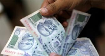 Rupee up 2 paise against dollar in early trade