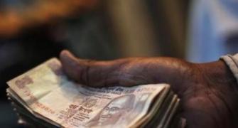 Rupee eases two paise vs US dollar to end at 60.20
