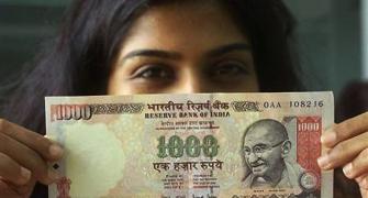 Rupee down 7 paise against dollar in early trade