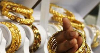 Decision on gold import curbs only after final CAD figures: FM