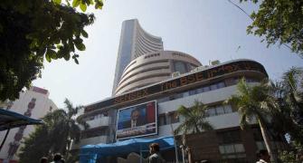 Sensex ends in green, awaits GDP data