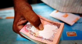 Rupee down 20 paise in morning trade