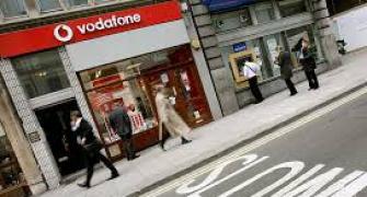 Why is the Vodafone chief concerned about high spectrum price