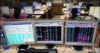 Markets in the red, Sensex still down over 200 points