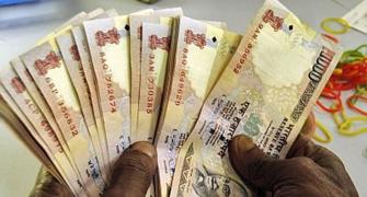 Rupee slips 15 paise against dollar
