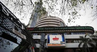 Sensex, Nifty in green; real estate slips, IT gains