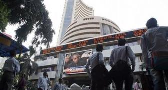 Sensex ends below 28,000; IT stocks drag Nifty