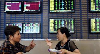 Chinese stocks rebound on share-sale ban; Hong Kong also up